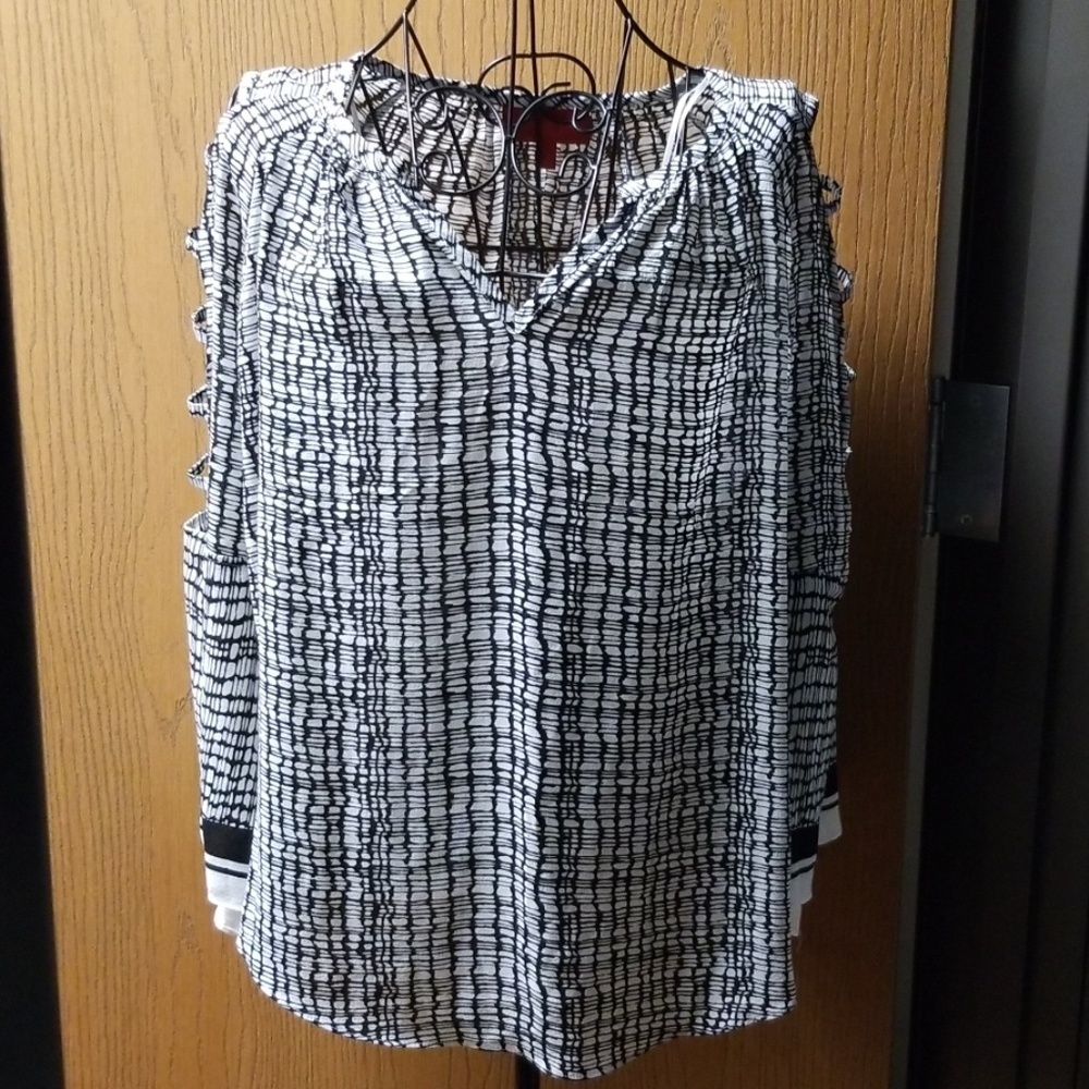 Long sleeved  black and white blouses